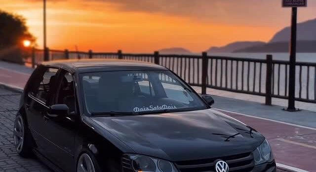 a VW Golf at sunset  | DSnKPprDeOi